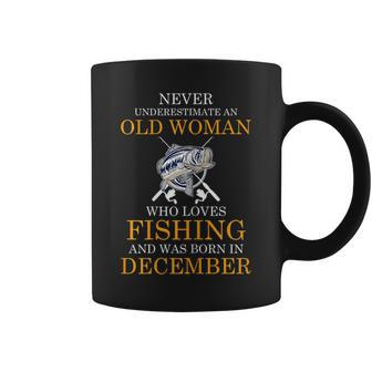 Never Underestimate An Old Woman Who Loves Fishing Women Gift For Womens Coffee Mug - Seseable