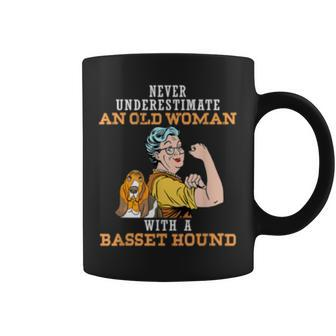Never Underestimate An Old Woman With Basset Hound Old Woman Funny Gifts Coffee Mug | Mazezy
