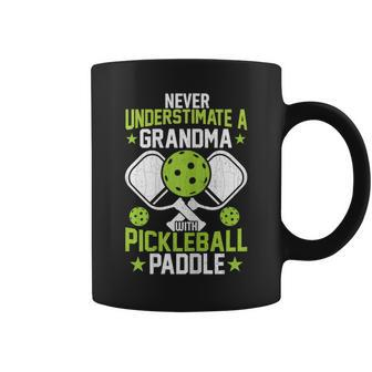 Never Underestimate Grandma Pickleball Player Paddle Graphic Coffee Mug - Seseable