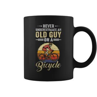 Never Underestimate Old Man With On A Bicycle Bike Cycling Coffee Mug - Seseable