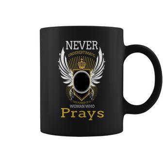 Never Underestimate The Power Of A Woman Who Prays Coffee Mug - Seseable