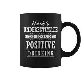 Never Underestimate The Power Of Positive Drinking Coffee Mug - Seseable