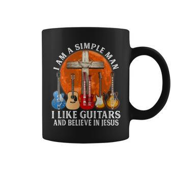 I Am A Simple Man I Like Guitars And Believe In Jesus Coffee Mug | Mazezy