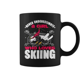 Ski Lovers Never Underestimate A Girl Who Loves Skiing Coffee Mug | Mazezy