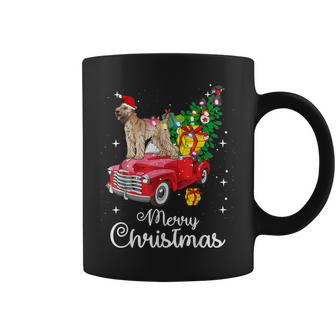 Soft Coated Wheaten Terrier Rides Red Truck Christmas Coffee Mug | Mazezy