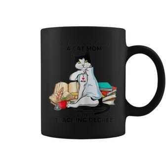 Never Underestimate A Cat Mom With A Teaching Degree Coffee Mug | Mazezy