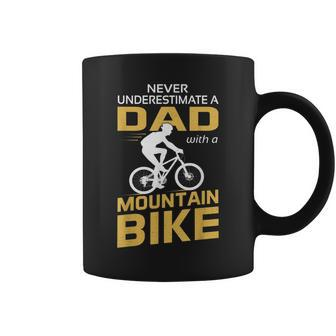 Never Underestimate A Dad With A Mountain Bike Coffee Mug - Monsterry