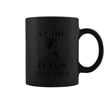 Never Underestimate A Girl Who Believe In Jesus December Coffee Mug | Mazezy