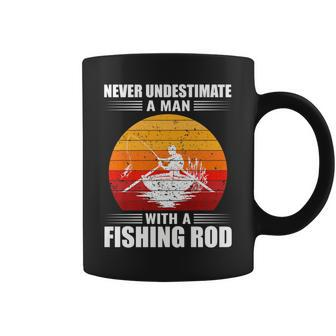 Never Underestimate A Man With A Fishing Rod Fishing Coffee Mug - Seseable