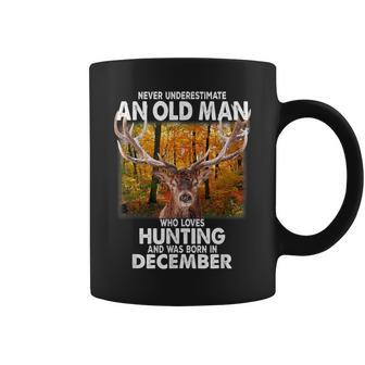 Never Underestimate A Man Loves Hunting Born In December Coffee Mug - Seseable