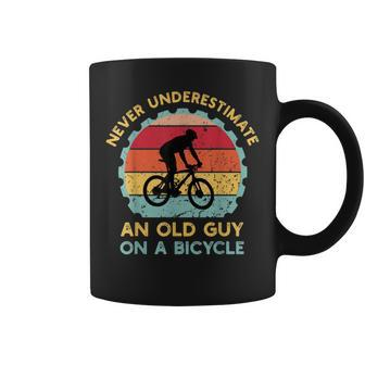 Never Underestimate An Old Guy On A Bicycle Vintage Coffee Mug - Seseable