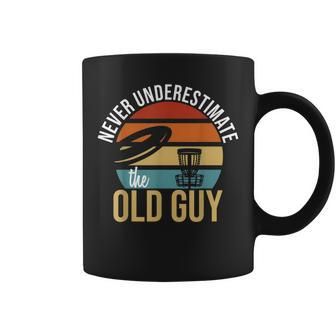Never Underestimate The Old Guy Retro Disc Golf Coffee Mug - Seseable