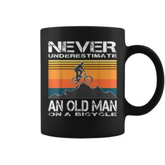 Never Underestimate An Old Man On A Bicycle Cycling Vintage Coffee Mug | Mazezy