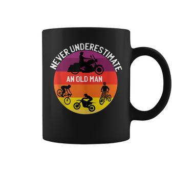 Never Underestimate An Old Man On A Bicycle Dirt Bike Coffee Mug - Seseable