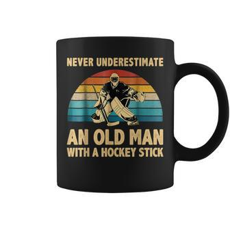 Never Underestimate An Old Man With A Hockey Stick Vintage Coffee Mug | Mazezy