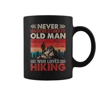 Never Underestimate Old Man Who Loves Hiking Vintage Coffee Mug - Thegiftio UK