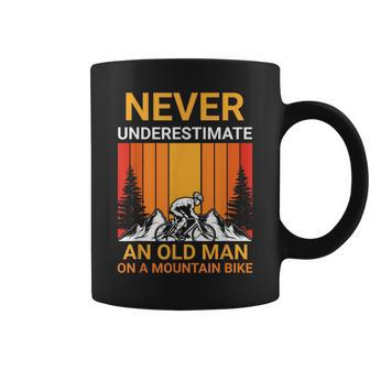 Never Underestimate An Old Man On A Mountain Bike Cycling Coffee Mug | Mazezy