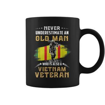 Never Underestimate An Old Vietnam Veteran Veteran Day Xmas Coffee Mug - Seseable