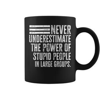 Never Underestimate The Power Of Stupid People Distressed Coffee Mug | Mazezy