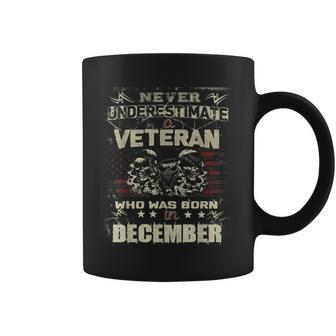 Never Underestimate A Veteran Who Was Born In December Coffee Mug | Mazezy
