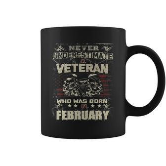 Never Underestimate A Veteran Who Was Born In February Coffee Mug | Mazezy