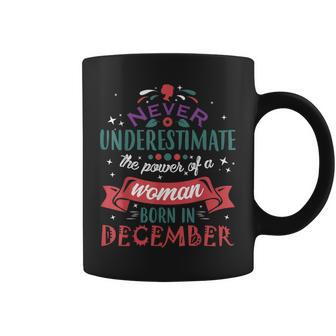 Never Underestimate A Woman Born In December Coffee Mug - Seseable