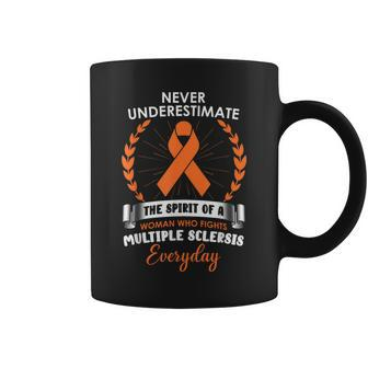 Never Underestimate A Woman Fights Multiple Sclerosis Coffee Mug - Monsterry