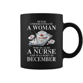 Never Underestimate A Woman Who Is Also A Nurse December Coffee Mug | Mazezy