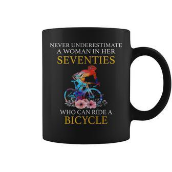 Never Underestimate Woman In Her Seventies Rides A Bicycle Coffee Mug - Seseable