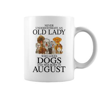 Dog Lover Never Underestimate An Old Lady Who Loves Dogs Coffee Mug | Mazezy