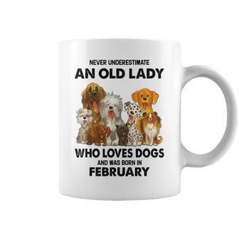 February Never Underestimate An Old Lady Who Loves Dogs Coffee Mug - Seseable