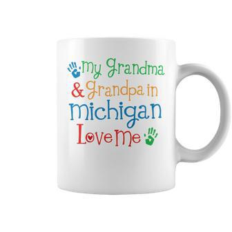 Kids Michigan Grandma And Grandpa Love Me Grandchild Gift Coffee Mug | Mazezy