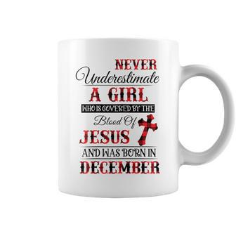 Never Underestimate A Girl Was Born In December Coffee Mug - Seseable