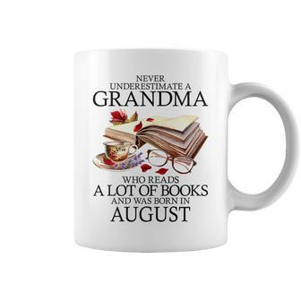 Never Underestimate A Grandma Who Reads Books Born August Coffee Mug - Seseable