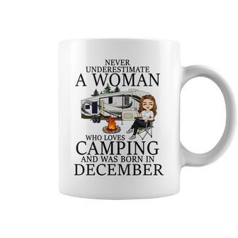 Never Underestimate A Woman Who Loves Camping Born December Coffee Mug - Seseable