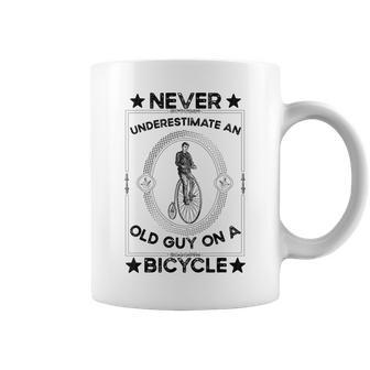 Never Underestimate An Old Guy On A Bicycle Vintage Cycling Gift For Mens Coffee Mug - Seseable