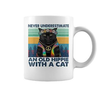 Never Underestimate An Old Hippie With A Cat Funny Gifts Coffee Mug - Seseable