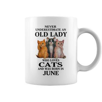 Never Underestimate An Old Lady Who Loves Cats Born In June Coffee Mug | Mazezy