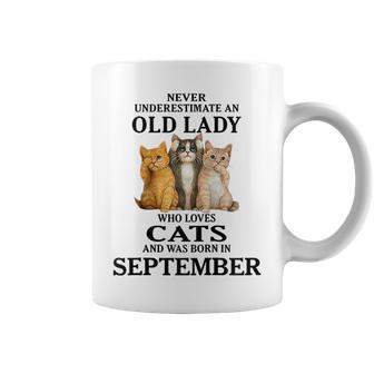 Never Underestimate An Old Lady Who Loves Cats September Gift For Womens Coffee Mug - Seseable