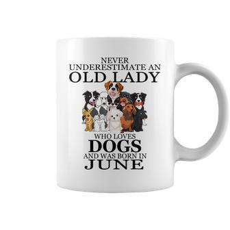 Never Underestimate An Old Lady Who Loves Dogs June Coffee Mug - Seseable