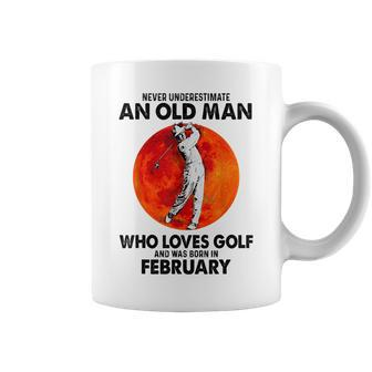 Never Underestimate An Old Man Loves Golf Born In February Gift For Mens Coffee Mug - Seseable