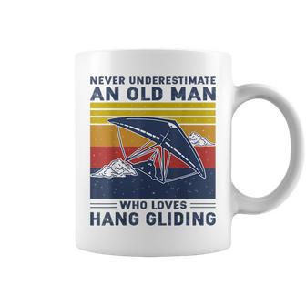 Never Underestimate An Old Man Who Loves Hang Gliding Old Man Funny Gifts Coffee Mug | Mazezy