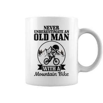 Never Underestimate An Old Man With A Mountain Bike Mtb Gift Gift For Mens Coffee Mug - Seseable