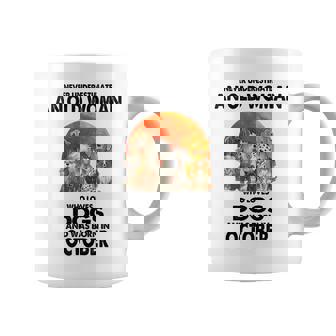 Never Underestimate An Old Woman Who Loves Dogs Born October Old Woman Funny Gifts Coffee Mug | Mazezy