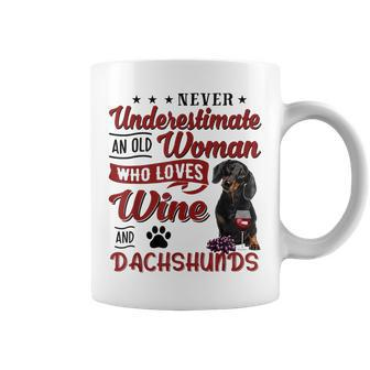 Never Underestimate An Old Woman Who Loves Wine & Dachshund Coffee Mug - Seseable
