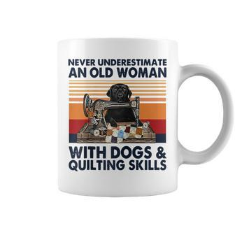 Never Underestimate An Old Woman With Dogs & Quilting Skills Coffee Mug - Seseable
