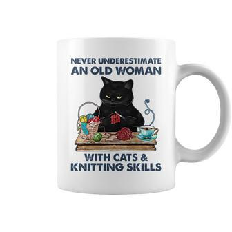 Never Underestimate And Old Woman With Cats And Knitting Coffee Mug