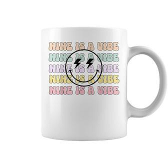 Nine Is A Vibe 9Th Birthday Retro Groovy Smile Face 9 Years Coffee Mug - Monsterry