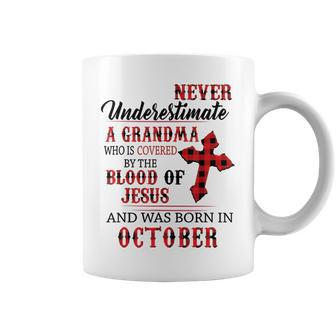 October Never Underestimate A Grandma Covered By The Blood Coffee Mug - Monsterry