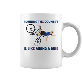 Running The Country Is Like Riding A Bike Funny Falling Running Funny Gifts Coffee Mug | Mazezy
